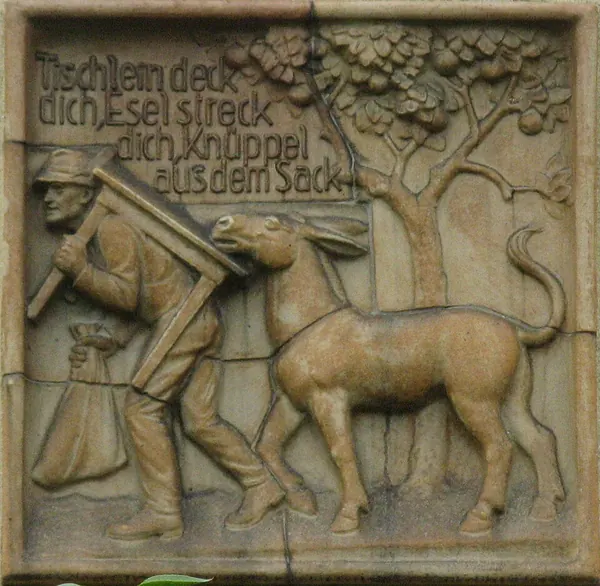 Capa de A mesa, o burro e o cacete